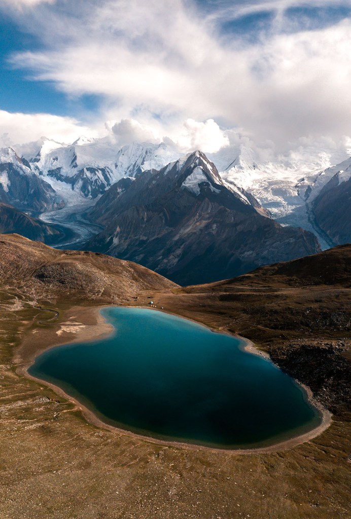An aerial photograph of Rush Lake in the in Hoper Valley region of Nagar, Gilgit-Baltistan, Pakistan.